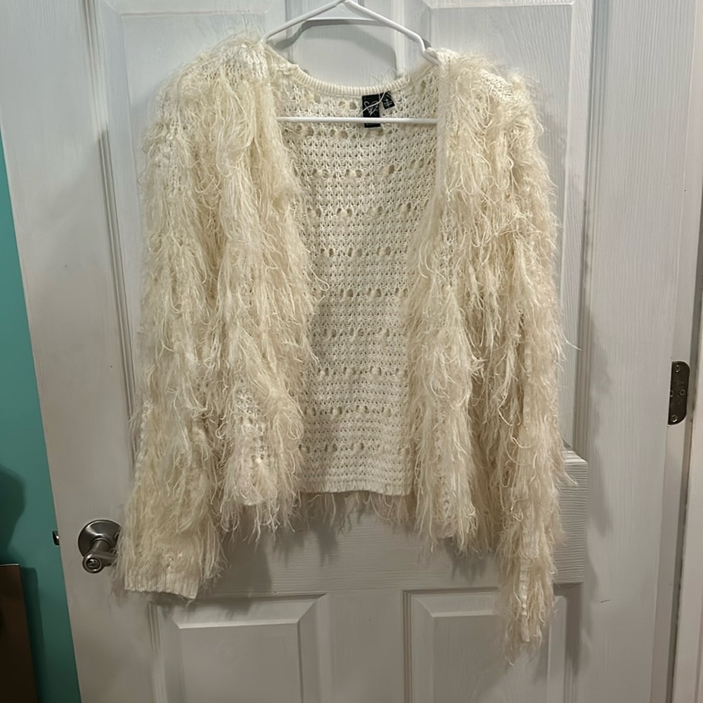 white fluffy jacket